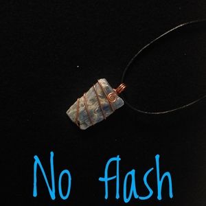 Kyanite copper wrapped chakra stone with leather cord